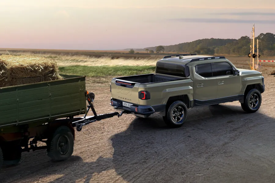 Kia Tasman towing caravan