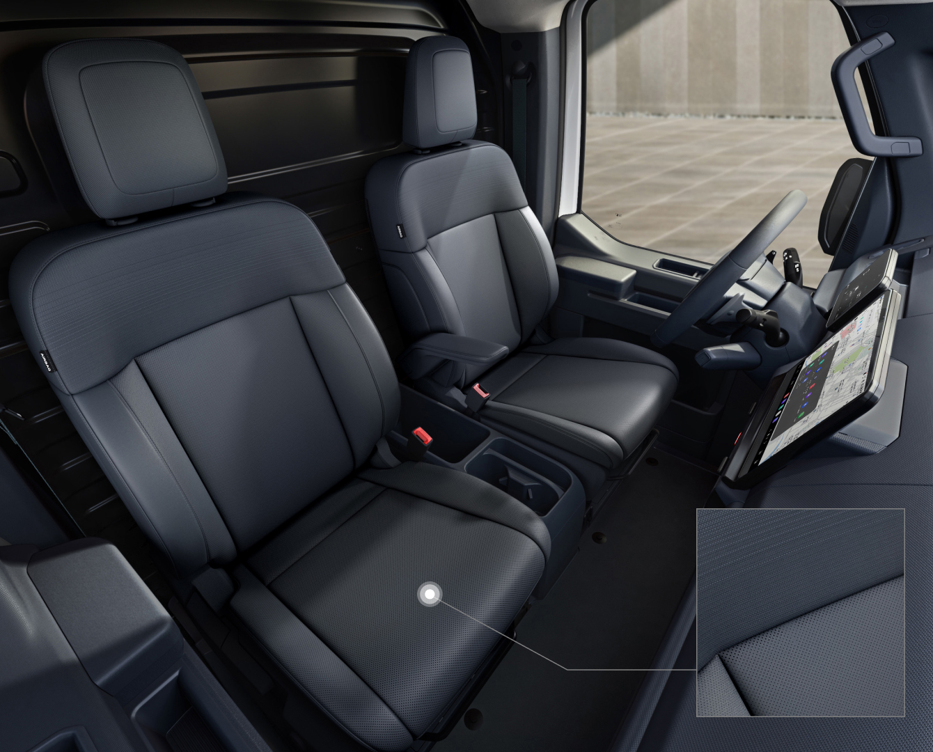 Front passenger and center seats of the Kia PV5 Cargo interior