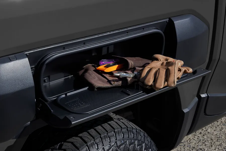 Kia Tasman side rear fender flare storage