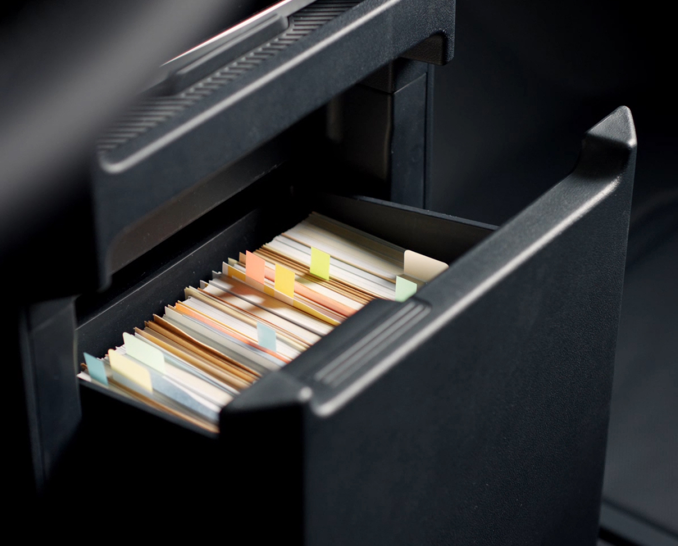 Center console drawer of the Kia PV5 Cargo with files stored inside