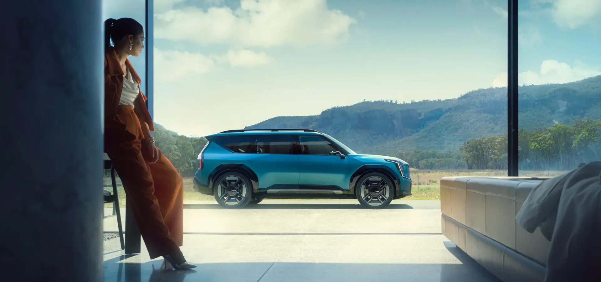 Kia ev9 gt-line ocean blue front three quarter view