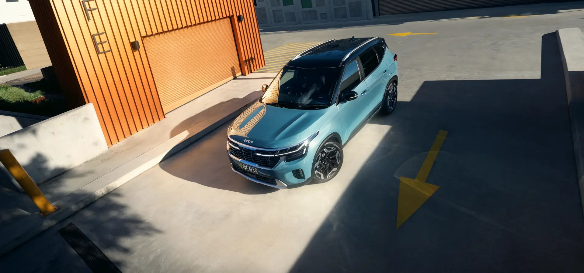 kia seltos GT-Line pluton blue front three quarter top view