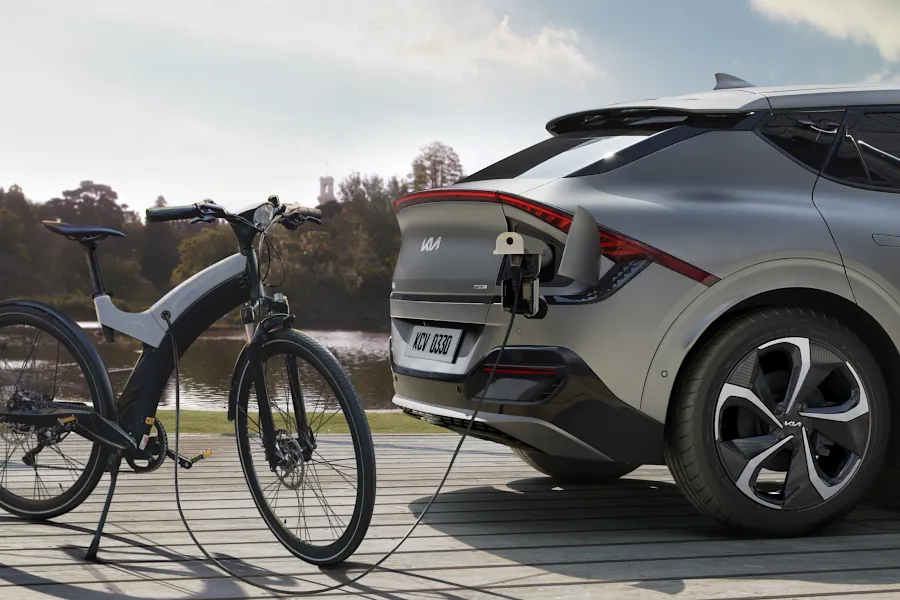 Kia EV6 charging vehicle to load V2L outdoors